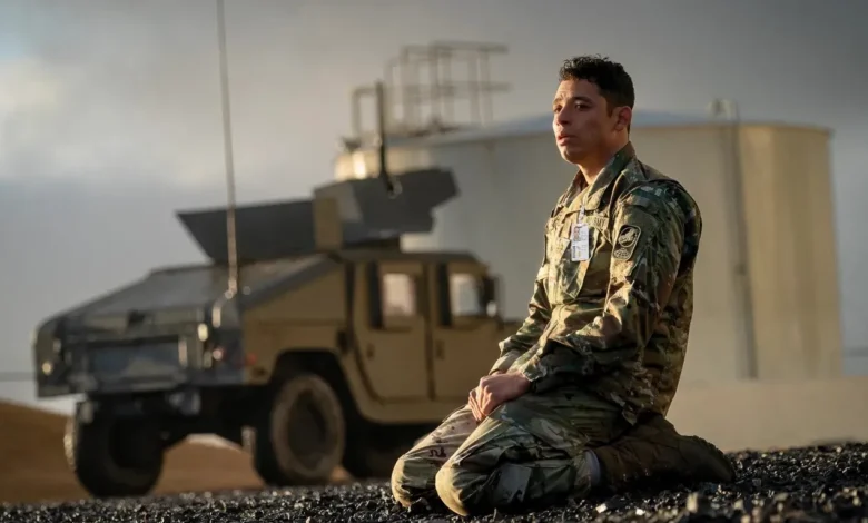 Soldier kneeling near a Humvee, possibly related to the Netflix movie "A House of Dynamite.