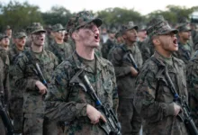 Mike Company Marines yelling during the Eagle, Globe, and Anchor Ceremony.