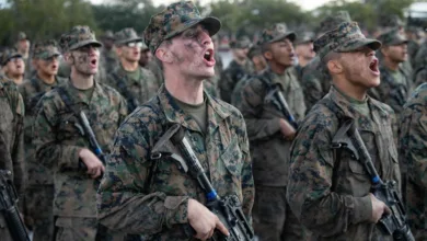 Mike Company Marines yelling during the Eagle, Globe, and Anchor Ceremony.