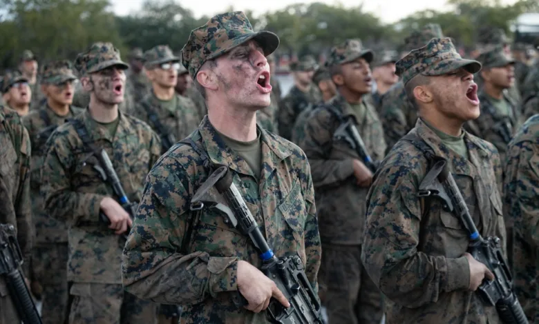 Mike Company Marines yelling during the Eagle, Globe, and Anchor Ceremony.