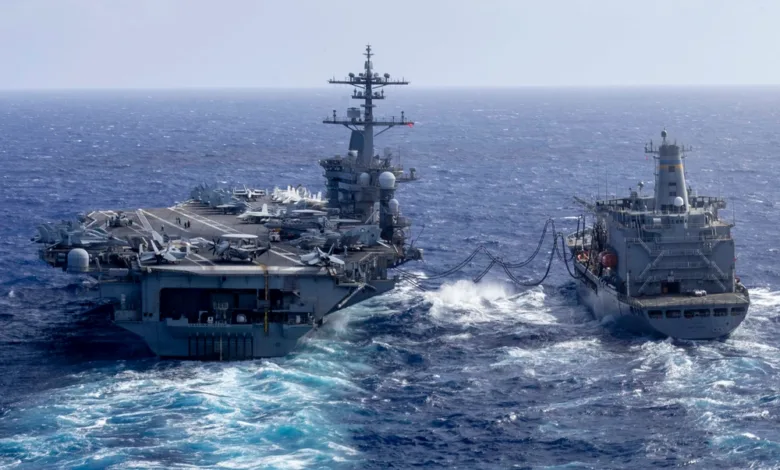 Abraham Lincoln aircraft carrier refueling from the Henry J. Kaiser replenishment oiler at sea.