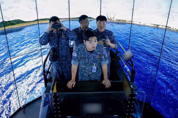 ROK Navy sailors in a submarine warfare simulator during Silent Shark 2025.