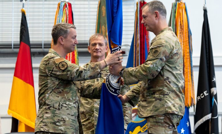USEUCOM change of command ceremony in Stuttgart: Two officers exchange flag.