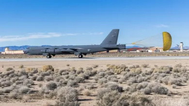 B-52 bomber deploying a parachute during landing at Edwards Air Force Base for radar upgrade testing.