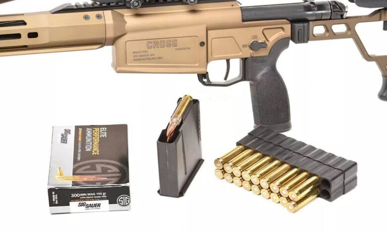 Sig Sauer Cross rifle chambered in .300 Win Mag with ammo and magazine.