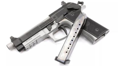 Beretta 92XI SAO tactical pistol with extended magazine. Text: "TYPE 92X1" and "MADE IN USA - 9mm PARA