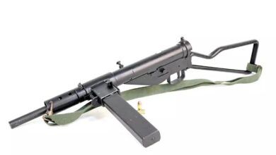 British Sten machinegun, a simplistic WWII submachine gun with a side-mounted magazine and wire stock.