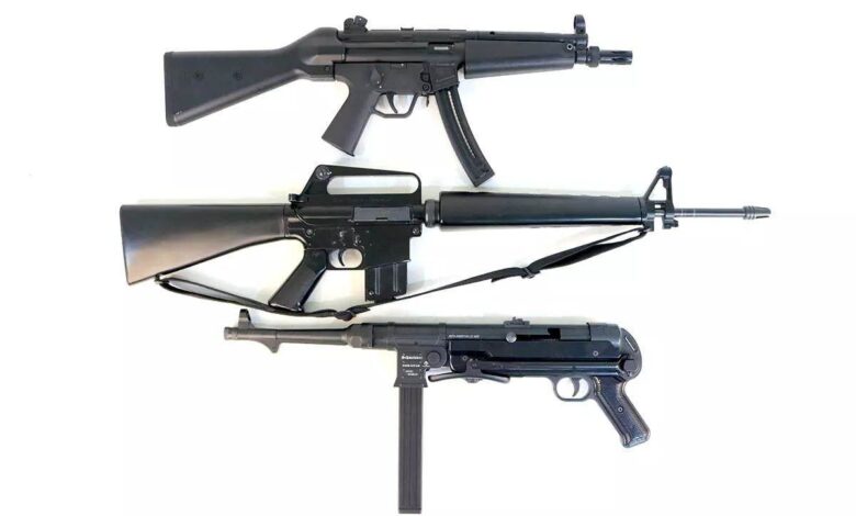 Three rifles, including a .22 rimfire replica rifle, displayed on a white background.