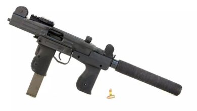 Uzi submachine gun with suppressor, magazine, and bullet. Rebuild project content.