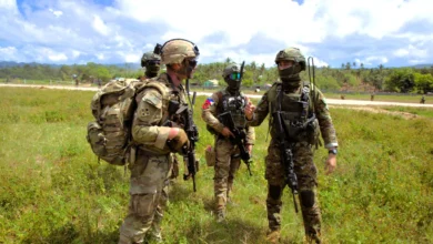 Philippine and U.S. soldiers during joint military exercises. Security aid cooperation.