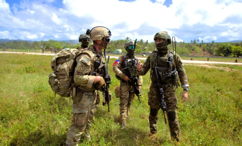 Philippine and U.S. soldiers during joint military exercises. Security aid cooperation.