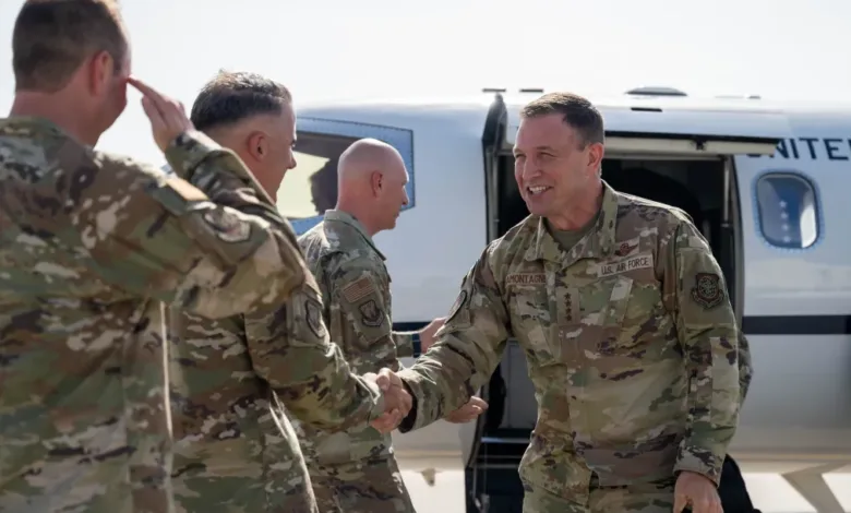 Gen. Lamontagne arrives, shaking hands with Air Force personnel. "U.S. Air Force" visible on uniform.