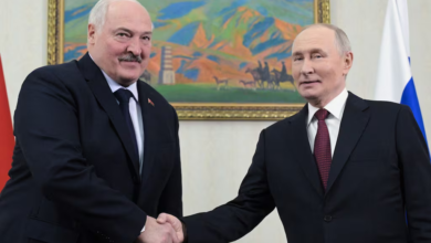Lukashenko and Putin shake hands in Belarus. Russian nuclear missiles topic of discussion.