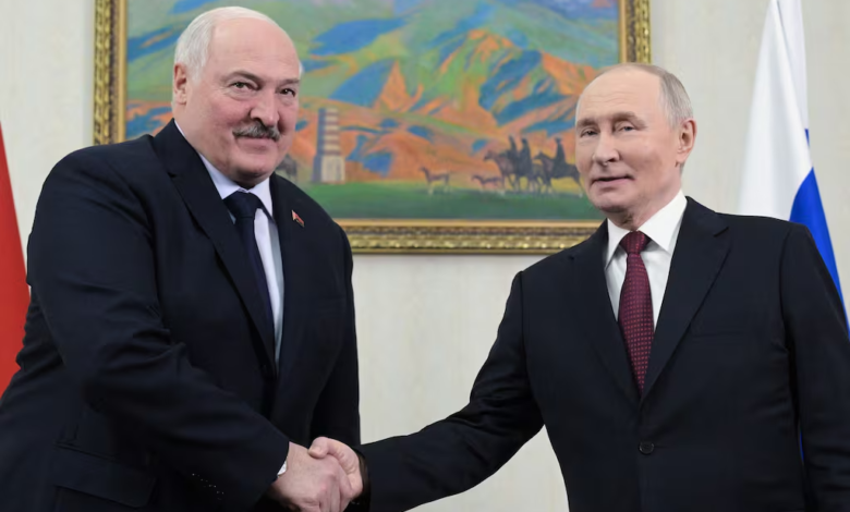 Lukashenko and Putin shake hands in Belarus. Russian nuclear missiles topic of discussion.