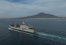 Italian Navy's Vulcano-class logistic support ship (LSS) A5335 sails near Mount Vesuvius. Fincantieri delivery.