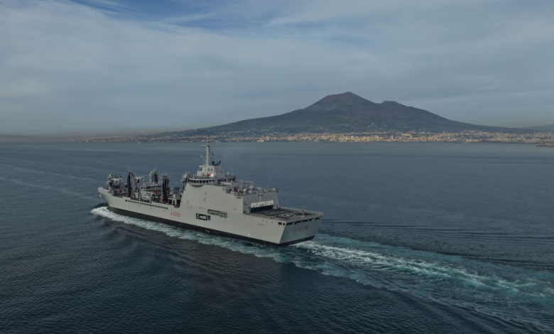 Italian Navy's Vulcano-class logistic support ship (LSS) A5335 sails near Mount Vesuvius. Fincantieri delivery.