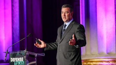 Speaker at Defense Talks discussing AI, innovation, and efficiency for the DOD.