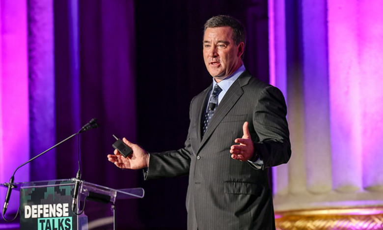 Speaker at Defense Talks discussing AI, innovation, and efficiency for the DOD.