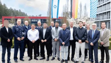 Group photo of officials with Israeli and German flags; Arrow 3 deal.