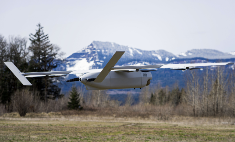 Hydrogen-powered drone flying against a mountain backdrop. DIU approved Blue UAS list.
