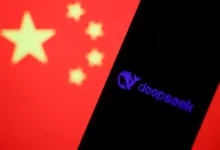 Deepseek logo on phone screen with China flag in background. Deepseek is a Chinese AI company.