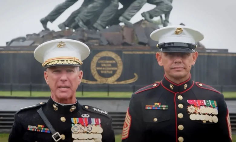 Marines in dress uniform stand before the Marine Corps War Memorial.