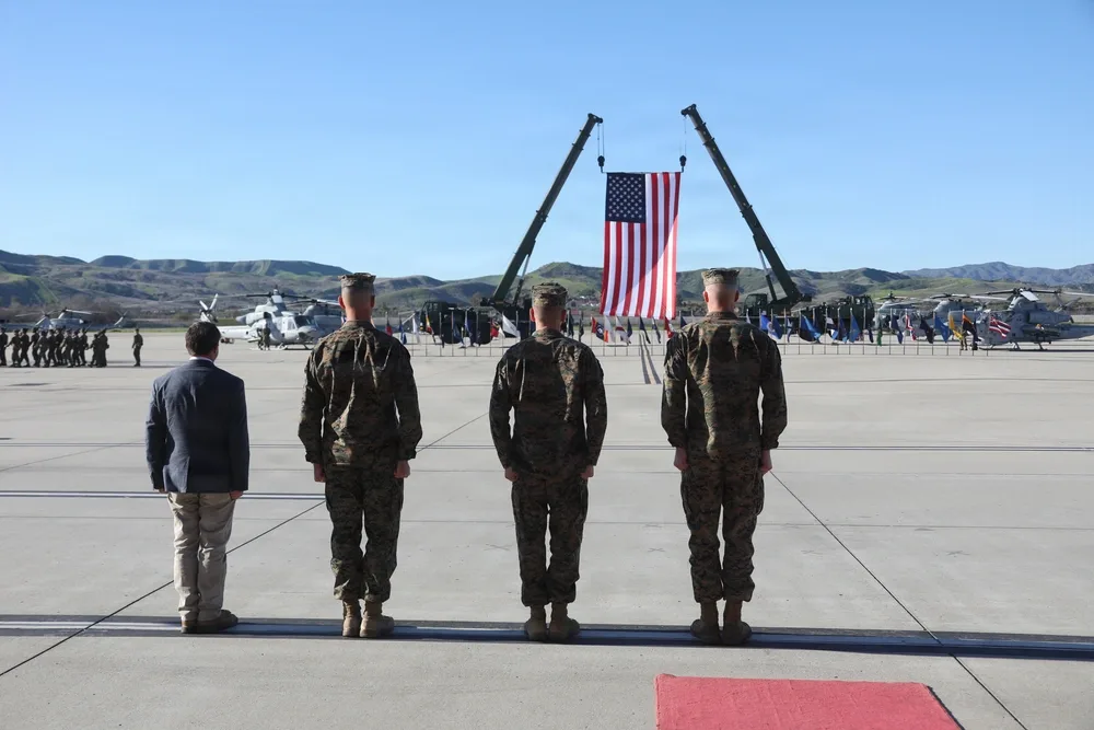Marines stand at attention during HMLA-169 change of command ceremony.