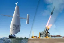 Saildrone with US flag, missile launch. Text: Saildrone, 3002.