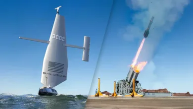Saildrone with US flag, missile launch. Text: Saildrone, 3002.