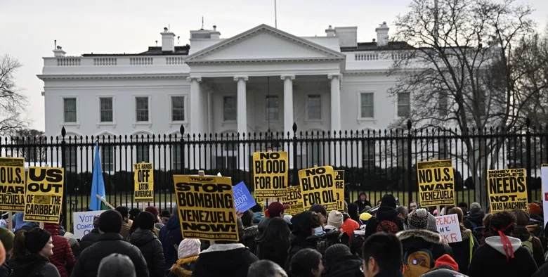 Protest against US war in Venezuela outside White House. Signs read "No Blood for Oil.