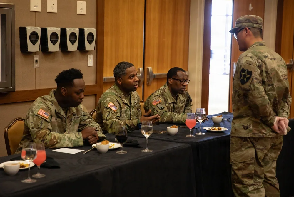 Army culinary team members at tasting, Eighth Army event.