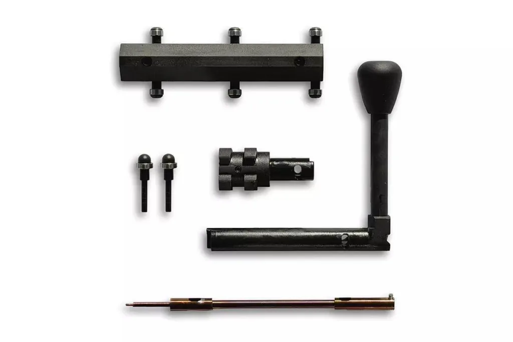 Auto-Ordnance Thompson TAO50 .50 BMG rifle parts laid out on a white surface.