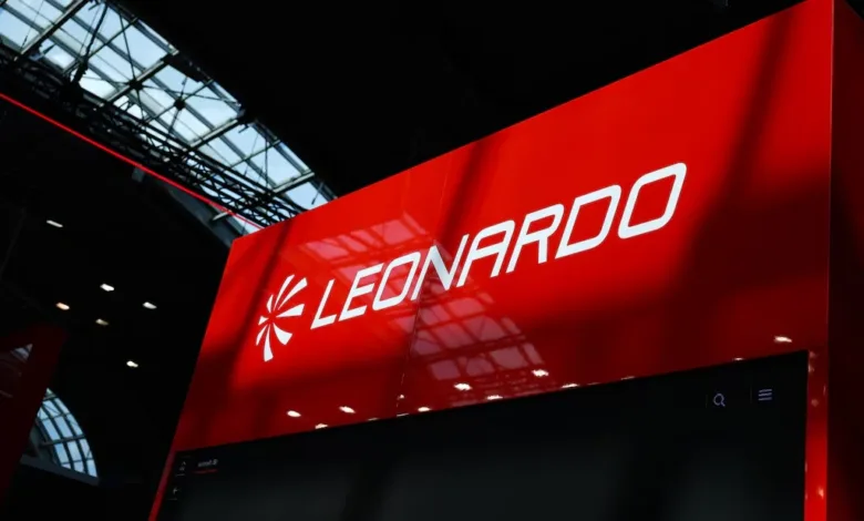 Leonardo company logo on a red display at an event.