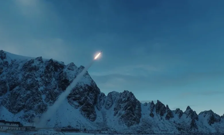Rocket launch against snowy mountains and blue sky.