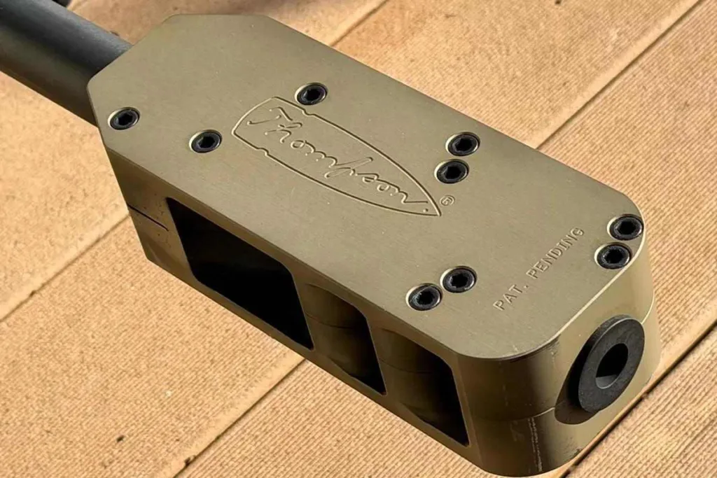 Thompson TAO50 .50 BMG rifle muzzle brake close-up. Pat. Pending.