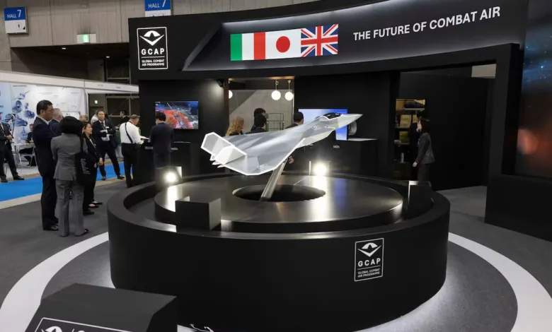 GCAP combat air display with model jet; Italy, Japan, UK flags.