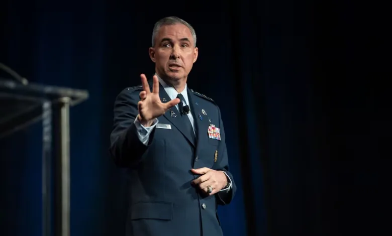 General speaking, military uniform, hand gesture. Leadership presentation.