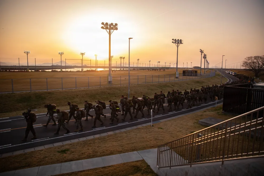 Marines hike at sunrise near MCAS Iwakuni, Japan. HHS supply hike.