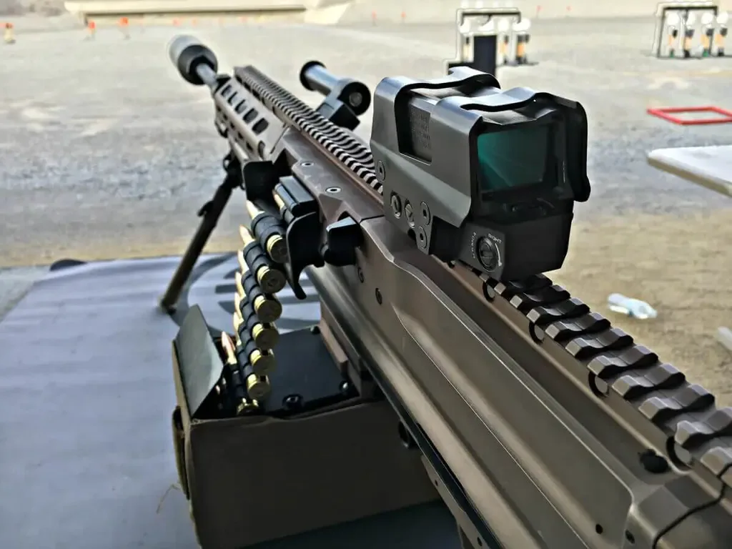 Seekins Precision heavy machine gun with optic and suppressor.