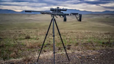 Seekins Precision rifle mounted on a tripod outdoors with scope.