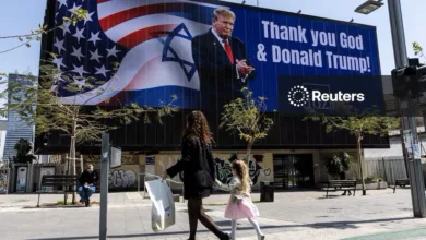 Billboard thanking God & Donald Trump in Israel, with US & Israeli flags.