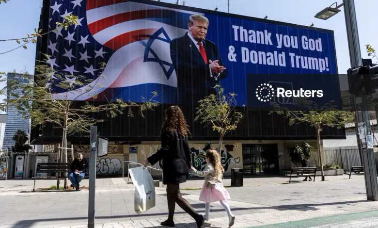 Billboard thanking God & Donald Trump in Israel, with US & Israeli flags.