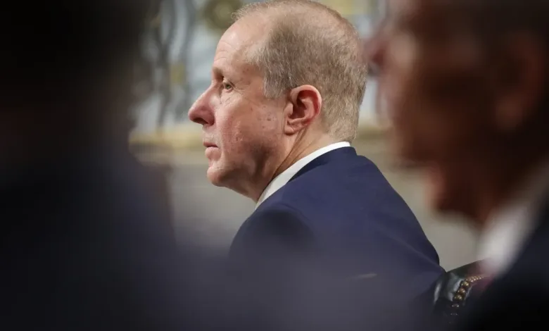 Profile of Jake Sullivan, National Security Advisor, at a meeting.