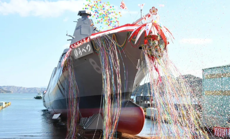 Japanese naval ship launch with colorful streamers and confetti