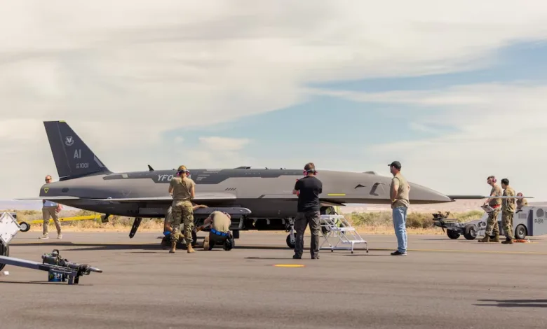 RQ-41 Mojave drone being prepped on the tarmac by ground crew.