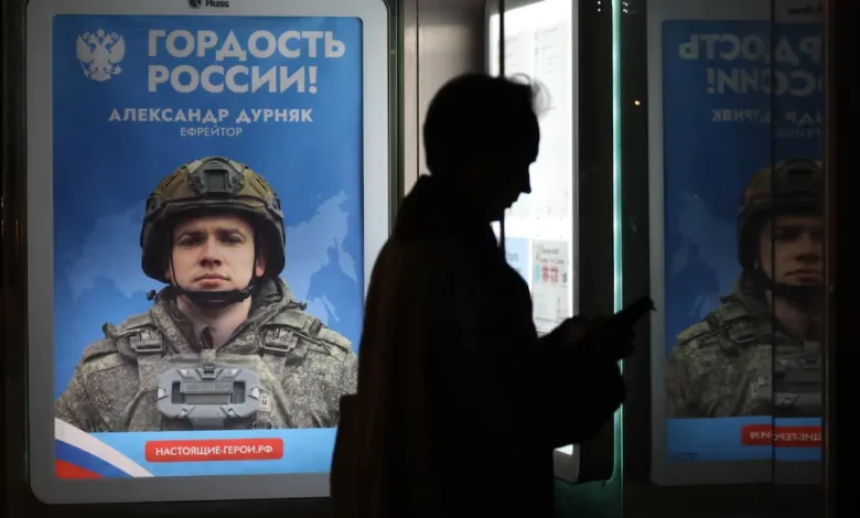 Poster of Alexander Durnyak, "Pride of Russia," in military gear.