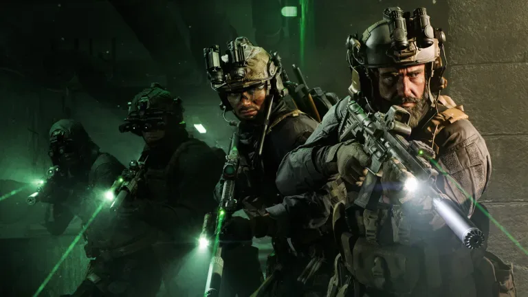 Soldiers in tactical gear with night vision and weapons in a dark setting.