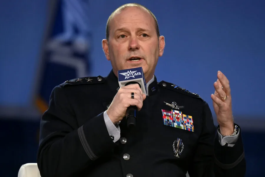 US Space Force General B. Chance Saltzman speaks into a microphone at an AFA event.